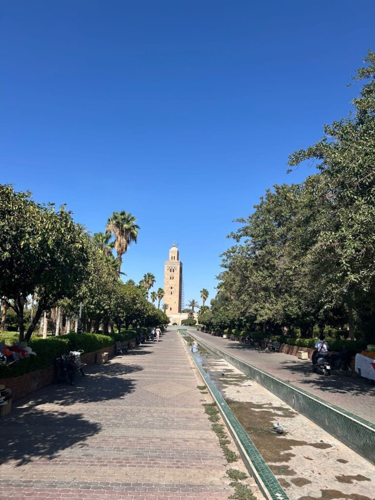 The Koutoubia minaret at the end of a tree-lined avenue in Marrakech